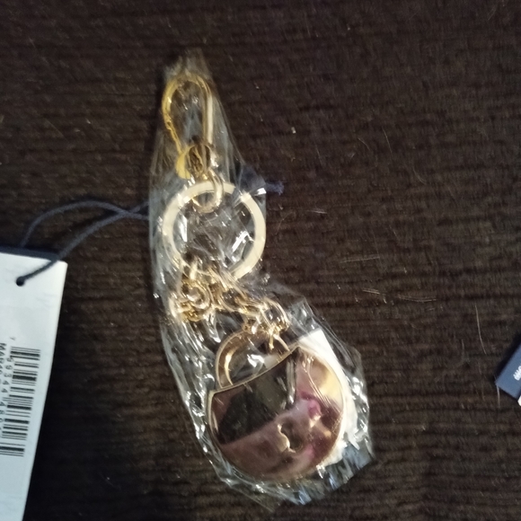 NWT DOONEY AND BOURKE HANGTAG - Picture 3 of 3